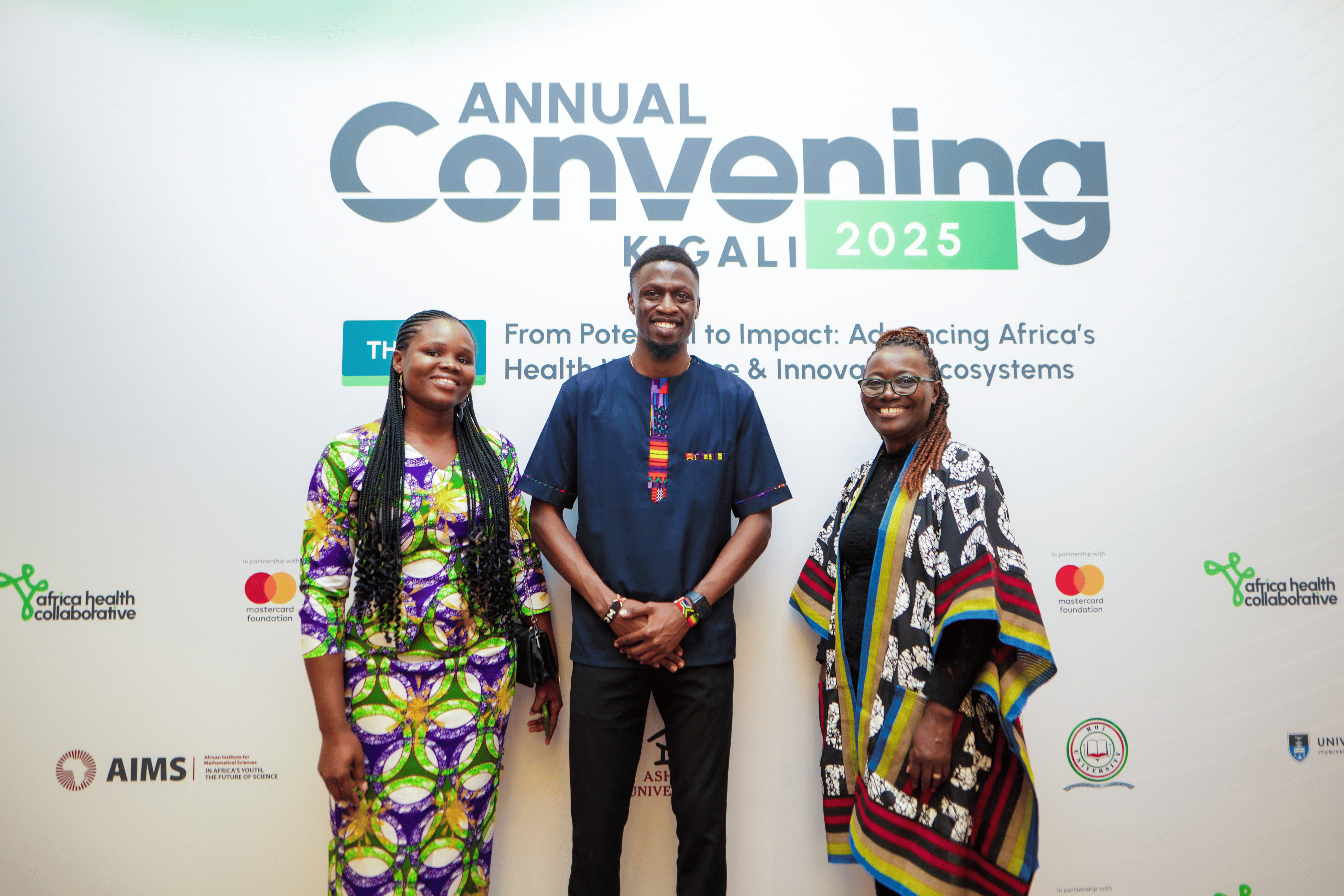 John Nyagaka at the center with Edwina Apaw to the right and another participant to his left at the Annual Convening